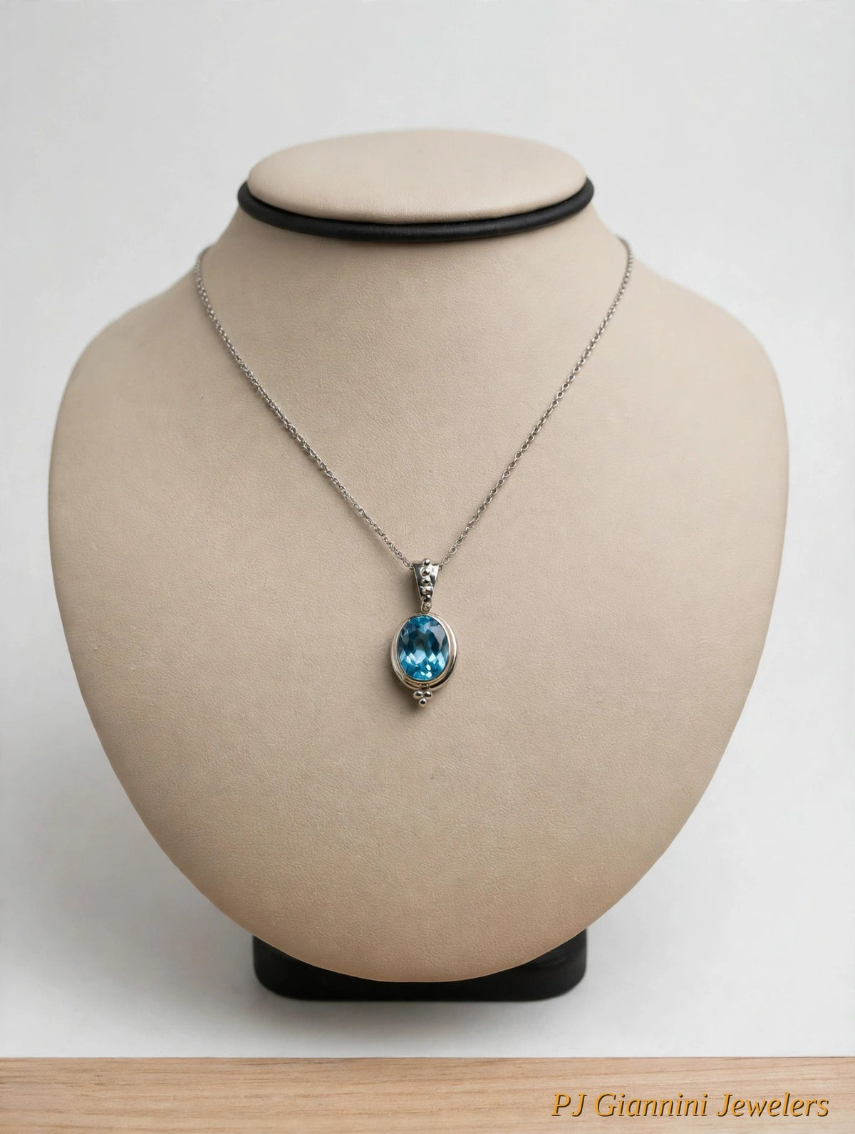 14K Gold Blue Topaz Oval Bezel Pendant Necklace — 18 in Sterling Silver Chain